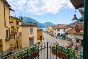 a view of a street from a balcony of a town at Casa Leo in Argegno