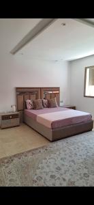Postel nebo postele na pokoji v ubytování Suites au sein d'une Villa au centre ville de Rabat