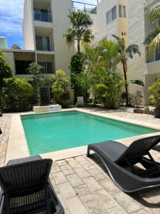 Bazén v ubytování Tiki Tiki Cosy Studio nebo v jeho okolí