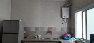 Kuchyň nebo kuchyňský kout v ubytování Logement entier, Jebha