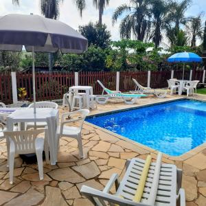 Swimmingpoolen hos eller tæt på Espaço Familiar