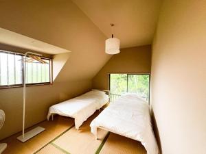 Фотография из галереи "undo" - a cottage in the forest - Vacation STAY 73229v в городе Narusawa +37 фотографий