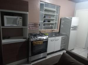 Köök või kööginurk majutusasutuses Hostchê compartilhados