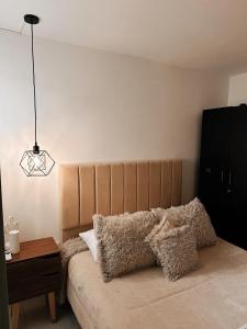 Voodi või voodid majutusasutuse Aquí, cada rincón te abraza, punto céntrico en la ciudad toas