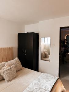 Voodi või voodid majutusasutuse Aquí, cada rincón te abraza, punto céntrico en la ciudad toas