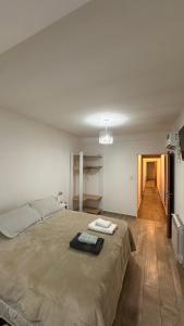 Ένα ή περισσότερα κρεβάτια σε δωμάτιο στο Duplex Jardines del Rey