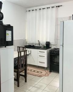 Dapur atau dapur kecil di AP número 1 +2 gambar