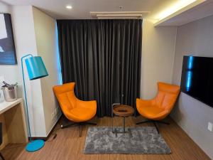 Posezení v ubytování Felix by STX Hotel & Suite