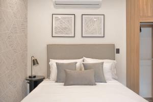 Postel nebo postele na pokoji v ubytování Marsellesa