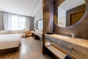 Φωτογραφία από το άλμπουμ του 深圳宝安机场碧海湾桔子水晶酒店 στο Σενζέν +18 φωτογραφίες