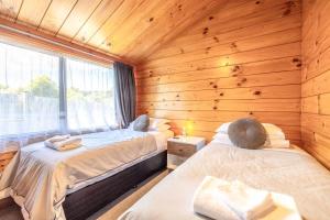 Postel nebo postele na pokoji v ubytování Hartlock in Onetangi