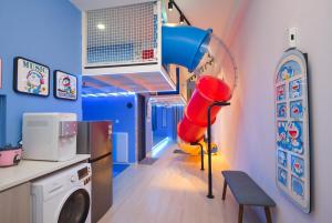 A kitchen or kitchenette at Sunway Grid Loft Suite by Nest Home【Olympic Size Pool】