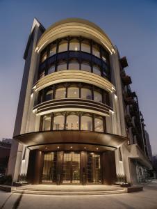 a large building with a lot of windows at North Bund 681 in Shanghai
