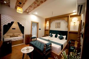 Ένα ή περισσότερα κρεβάτια σε δωμάτιο στο Staykart Boutique Hotel