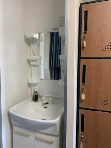 Bilik mandi di Fukuoka Tabiji Hostel & Guesthouse