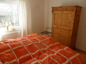 En eller flere senge i et værelse på Schön wohnen in der Rhön