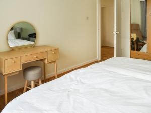 Postel nebo postele na pokoji v ubytování Gwynfa