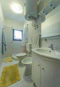 Kúpeľňa v ubytovaní Apartments Jurišević + 37 fotografií