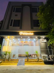 a building with a sign on the front of it at Hotel Pilgrim walking distance From Golden Temple in Amritsar