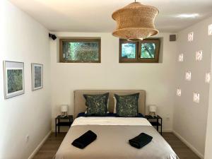 En eller flere senge i et værelse på Vadrózsa kertkapcsolatos apartman