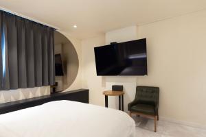 TV a/nebo společenská místnost v ubytování Hotel Daily