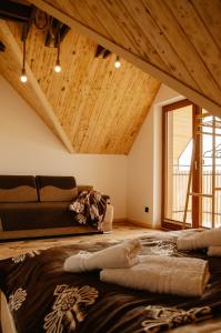 Ένα ή περισσότερα κρεβάτια σε δωμάτιο στο Czorsztyn Vista House