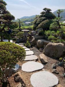 a stepping stone pathway in a japanese garden at 蒼々さぬき志度 SOUSOU Sanuki Shido in Sanuki