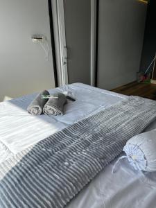 Postel nebo postele na pokoji v ubytování Fortune Cube