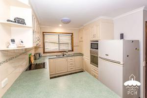 Dapur atau dapur kecil di Stay on Callaway +6 gambar