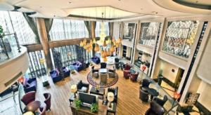 an overhead view of a living room with couches and chairs at Argyle International Airport Hotel Shanghai in Shanghai