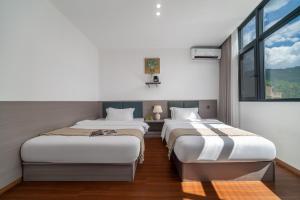 Cama o camas de una habitación en Wangxian Mountain Retreat B&B-Wangxian Valley Scenic Area