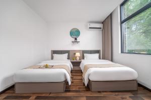 Cama o camas de una habitación en Wangxian Mountain Retreat B&B-Wangxian Valley Scenic Area
