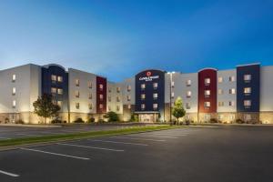 a parking lot in front of a large building at Candlewood Suites Springfield By IHG in Southlawn