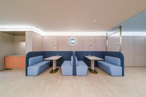 Χώρος καθιστικού στο Hanting Hotel Beijing Guang'anmen Daguanying Subway Station