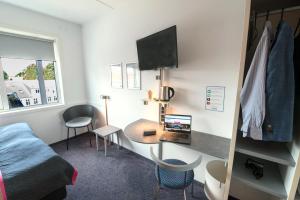 TV o dispositivi per l'intrattenimento presso Cabinn Aalborg