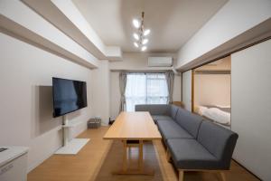TV a/nebo společenská místnost v ubytování Ushamy's KOKURA STAY No 04