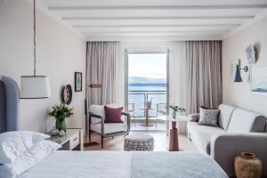 a hotel room with a bed and a view of the ocean at Amadria Park Grand Hotel 4 Opatijska Cvijeta in Opatija