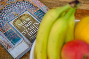 a bowl of bananas and apples on a table at Artemis 102 - Seaside Stories in Livadhia