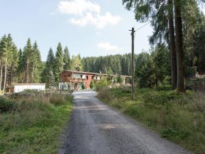 a dirt road in front of a house at Luxurious Apartment in Jägersgrün with Saunas in Jägersgrün