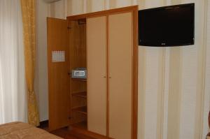 TV a/nebo společenská místnost v ubytování Hotel Ristorante Donato