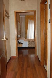 Postel nebo postele na pokoji v ubytování Hotel Ristorante Donato