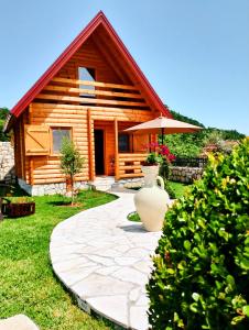 Giardino di Magical Log House