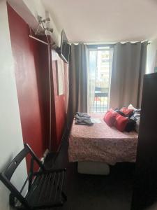 En eller flere senge i et værelse på Paris 4U