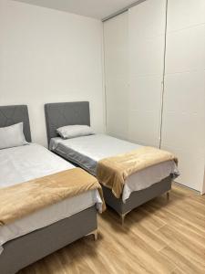 Postel nebo postele na pokoji v ubytování Vila Dusan