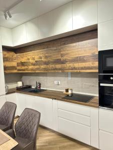 Kuchyň nebo kuchyňský kout v ubytování Vila Dusan