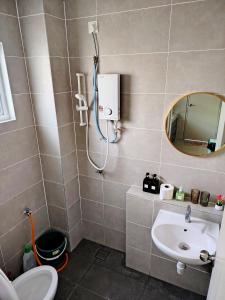 Et badeværelse på 风之居民宿 Windstay