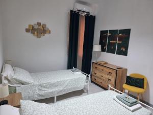 Voodi või voodid majutusasutuse Civico 89 affittacamere toas