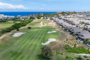 an aerial view of a golf course at a resort at Villa Jazmyn 15 Blue Bay Beach with Private pool in Sint Michiel