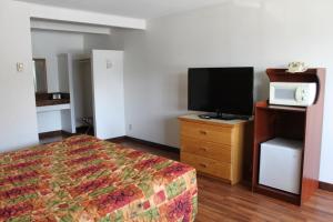 TV a/nebo společenská místnost v ubytování Motel 101 + 19 fotografií