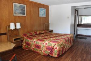 Postel nebo postele na pokoji v ubytování Motel 101